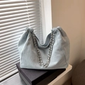 Light blue denim hobo bag with metal chain strap and spacious interior for daily use - Light Blue
