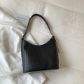 Handwoven black bucket bag with intricate lattice texture and long shoulder strap - Black without Pendant