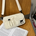 Off-white nylon crossbody bag with multi-pocket design and adjustable canvas strap - White