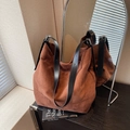 Large dark brown suede tote bag with black adjustable strap in a minimalist hobo style - Coffee