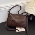 Vintage dark brown crossbody bag with leather texture and multi-zipper detail - Brown