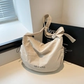 Minimalist beige pleated crossbody hobo bag with wide shoulder strap and knot detail - White