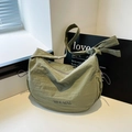 Olive green crinkled nylon crossbody bag with large capacity and knotted strap - Green