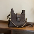 Dark brown faux leather crossbody bag with snakeskin texture and black square clasp - Brown