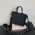 Borsa tote minimalista in nylon nero con manici e tracolla regolabile per il lavoro - Nero