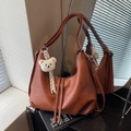 Brown vintage faux leather tote bag with shoulder strap and plush bear keychain charm - Brown