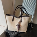 Chic beige tote bag with brown handles and a plush bunny charm for daily commute - Cream White With Pendant