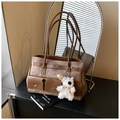 Detailed view of brown vintage tote bag with double front pockets and cute bear charm - With Pendant / Brown