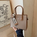 Retro brown canvas square handbag with caramel leather trim and wide fashion strap - Brown