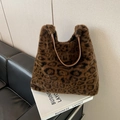 Faux fur leopard print tote bag with brown leather handles for winter fashion style - Brown