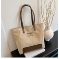 Cream corduroy tote bag with brown leather handles and base, elegant casual design - Khaki