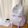Light purple school backpack with sweet bow and lace details in a cozy study setting - Grey And Purple Without Charm