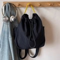Large capacity black canvas drawstring backpack with yellow woven handle for school or travel - Black