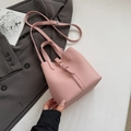 Pink lychee grain leather bucket bag with silver buckle and adjustable shoulder strap - Pink Without Pendant