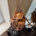 Mini caramel brown leather backpack with dual front pockets and adjustable straps - Brown