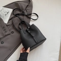 Minimalist black litchi grain bucket bag with silver hardware and shoulder strap - Black without Pendant