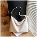 Large white suede hobo bag with adjustable shoulder strap and vertical seam detail - Off White