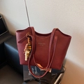 Burgundy faux leather tote bag with gold logo lettering and beaded tassel charm - Wine Red With Pendant