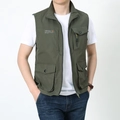 Detail of army green utility vest showing multi-pocket design and stand collar - M / Army Green