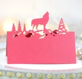 Laser-cut red Christmas tree and wolf seating card with sparkling paper for festive table decor - Pearlescent Red