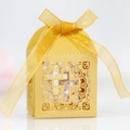 Golden laser-cut wedding favor box with hollow cross design and decorative ribbon bow - Gold