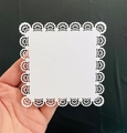 Detailed view of white square paper doilies with laser-cut floral lace patterns for crafts - Pattern 1 (White-1)