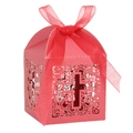 Macro shot of red laser-cut candy box with cross pattern and silk ribbon detail - Pearlescent Red