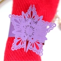 Purple laser-cut snowflake napkin ring with a pearlescent finish for festive table decor - Deep purple