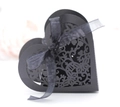 Close-up of heart-shaped black laser-cut favor box with elegant butterfly pattern - Black Khaki