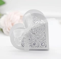 Elegant laser cut heart wedding favor box with white ribbon and floral vine patterns - White