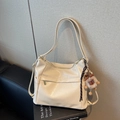 Chic cream white large capacity shoulder bag in glossy faux leather with plush lion charm - Cream White With Pendant