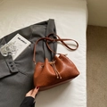 Brown pleated bucket bag in matte PU leather with gold chain drawstring and slim strap - Brown (Without Pendant)