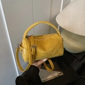 Vintage cilindervormige kussentas in gembergeel met matte suède look en verstelbare riem - Geel