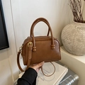 Chic brown lychee pattern bowling bag with top handles and adjustable strap - No Pendant / Brown