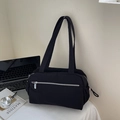Minimalist black tote bag in nylon with long handles and front silver zipper detail - Black