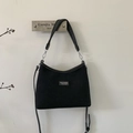 Minimalist black wool shoulder bag with Lazy Breeze metal plaque and leather strap - Black Small