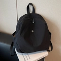 Classic black nylon backpack featuring a silver metal M logo for women and students - Black