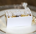 White Christmas hollow snowflake gift box for two chocolates on elegant porcelain plate - White