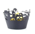 Detail of laser-cut Halloween cupcake wrapper with pumpkin and ghost motifs on black paper - Black