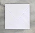 Minimalist white square paper envelope with classic V-flap design on marble surface - Western Square White / White