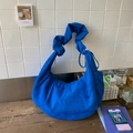 Detail of blue velvet crescent bag with scrunchie strap and drawstring design - Blue
