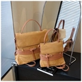Detail of matte suede messenger bags in two sizes with decorative leather straps and buckles - Brown Large