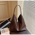 Detail of coffee brown oversized matte PU leather tote bag in a minimalist hobo design - Coffee