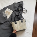Khaki crossbody bucket bag with black leather straps and gold logo in a stylish setting - Off-white Without Pendant