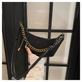 Detail of black suede crescent bag featuring gold chain and knotted strap craftsmanship - Black