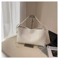 Detail of white leather shoulder bag with woven drawstring texture and braided handle - White