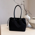 Minimalist black nylon tote bag with drawstring closure and slim double handles - Black