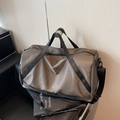 Sac de voyage taupe grande capacité avec poignées noires et bandoulière en nylon robuste - Gris