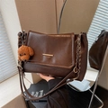 Retro dark brown chain shoulder bag with minimalist gold buckle and plush bear charm - With Charm / Brown