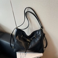 Minimalist black large capacity crossbody bag with vintage soft leather and golden ring - Black